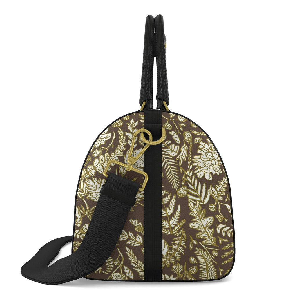 Averly Brown,  gold and ivory duffle bag